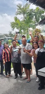 Group enjoying a poolside tropical resort gathering.