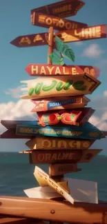 Vibrant signpost with ocean background under a clear sky.