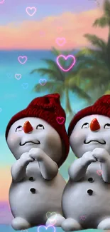 Snowmen with red hats on tropical beach with heart graphics.