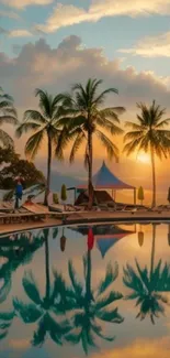 Tropical beach sunset with palm trees reflected in a pool.