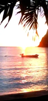 Tropical beach at sunset with a boat and palm leaves.