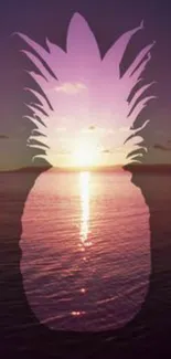 Sunset over ocean with pineapple silhouette overlay.