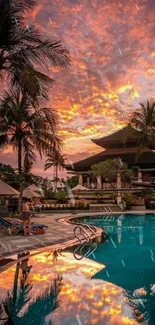 Tropical sunset over poolside paradise with vibrant sky reflections.