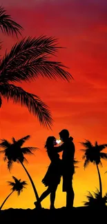 Romantic couple silhouette under vibrant tropical sunset with palm trees.