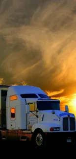 White truck under dramatic orange sunset sky.