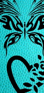 Black butterfly and heart on turquoise textured background.