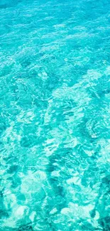 Turquoise ocean water wallpaper with beautiful patterns.