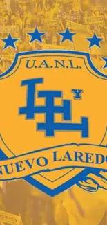 UANL Nuevo Laredo emblem with yellow background and blue details.