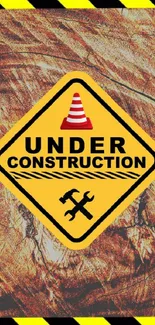 "Under Construction" sign with wood texture background.