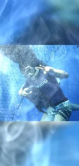 Diver underwater with a large fish in deep blue ocean scene.