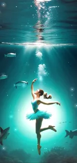 Graceful ballerina underwater in deep teal ocean with soft glowing light.