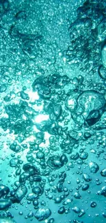 Turquoise underwater bubbles with light shining through.