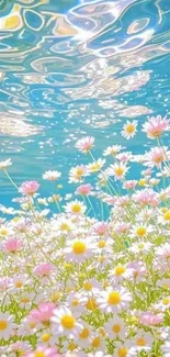 Delicate pink flowers beneath rippling turquoise water.