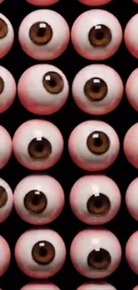 A wallpaper featuring a pattern of realistic eyeballs on a black background.
