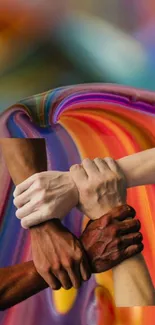 Interlocked hands on colorful swirling background symbolizing unity.