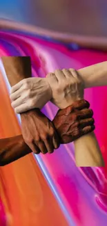 Interlocked hands on colorful background symbolizing unity and diversity.