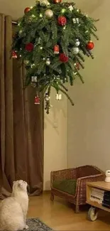 Upside-down Christmas tree in living room with curious cat watching.