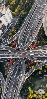 Aerial view of intricate urban highway intersection.