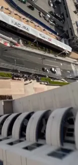 Aerial city view of streets and buildings from above.