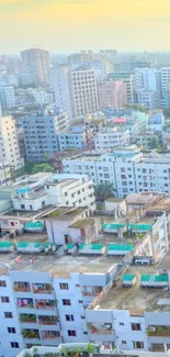 Vibrant urban cityscape with diverse buildings and a blue sky.