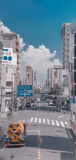 Urban city street with blue sky and modern buildings.