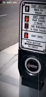 Close-up of a crosswalk button and traffic sign in an urban setting.