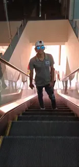 Man riding an escalator in stylish attire.