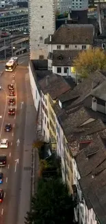 Aerial view of city street with historic buildings at dusk.