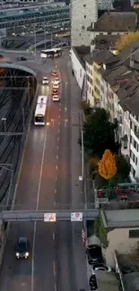 Urban evening cityscape with roads and buildings.