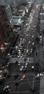 Bustling city street view with evening lights.