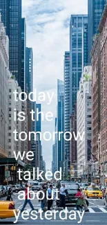 City street wallpaper featuring a motivational quote and iconic yellow taxi.