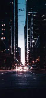 Dark urban street at night with city lights glowing.