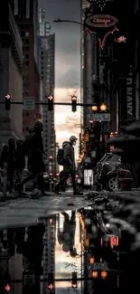 Urban night street scene with reflections in a puddle and city lights.