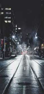 Moody urban night street with glowing city lights and misty ambiance.