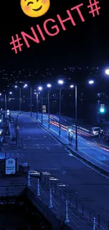 Urban night street with blue lights and a smiley face emoji.