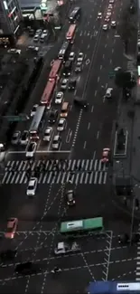 A vibrant urban street scene at night showcasing city lights and traffic.