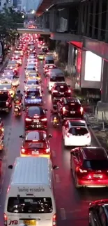 Nighttime traffic jam in a bustling city street.