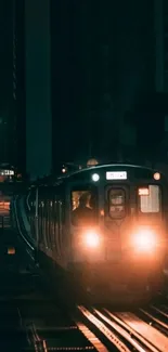 Nighttime city train wallpaper with urban lights and dark atmosphere.