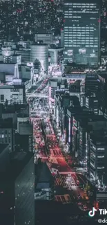 Nighttime cityscape with vibrant urban lights.