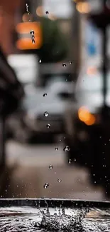 Raindrops splash in an urban setting, capturing a serene city moment.