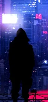 Silhouette of a person in front of a neon-lit cityscape at night.