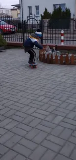 Kid skateboarding on city sidewalk in motion.