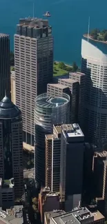 Aerial view of a vibrant cityscape featuring modern skyscrapers and a blue sky.