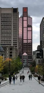 Urban skyline view with cloudy sky and pedestrians walking.