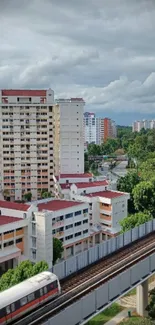 Urban skyline with railway and greenery.