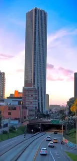 Mobile wallpaper showing a skyscraper at sunset.