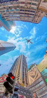 Viewing skyscrapers and a plane through a vivid blue sky in an urban scene.