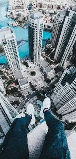 Aerial view of skyscrapers in an urban cityscape with a vibrant blue sky.