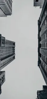 Dramatic urban skyscraper view against the sky, showcasing towering architecture.
