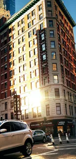 Urban street bathed in golden sunlight with busy traffic.